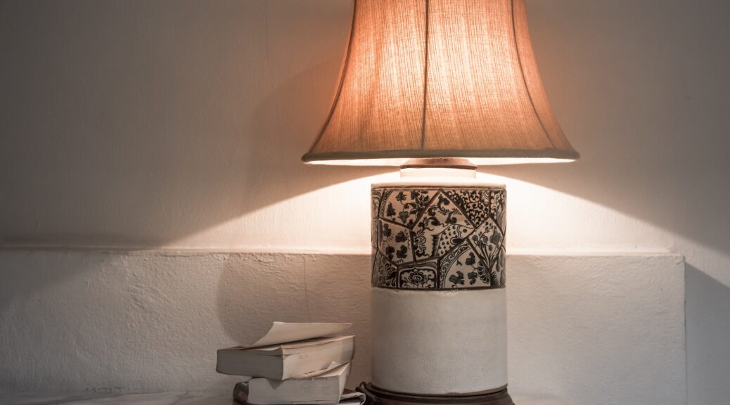 lamp with books on the table